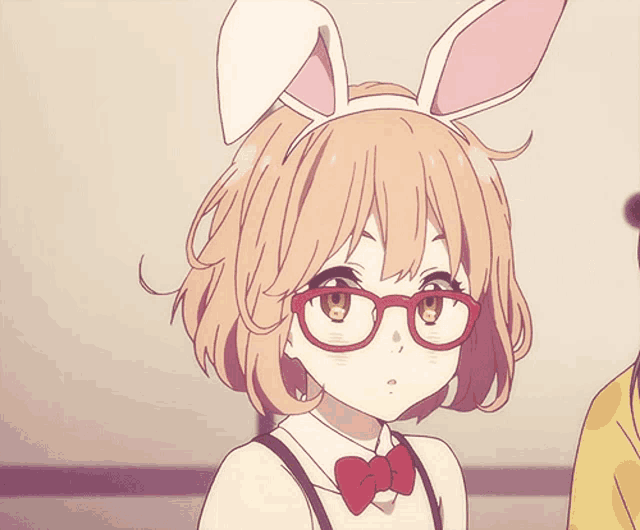 a girl wearing bunny ears and glasses is looking surprised