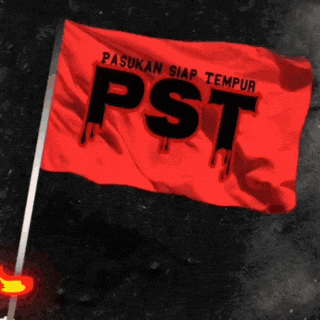 a red flag that says pasukan siap tempur pst