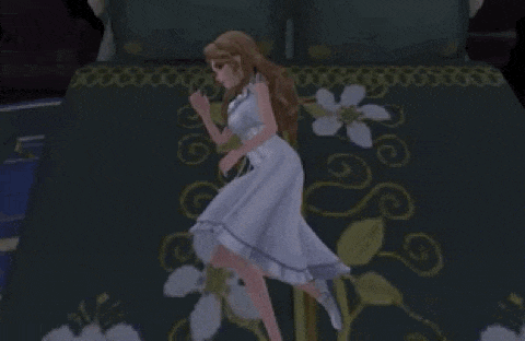 a woman in a white dress laying on a bed