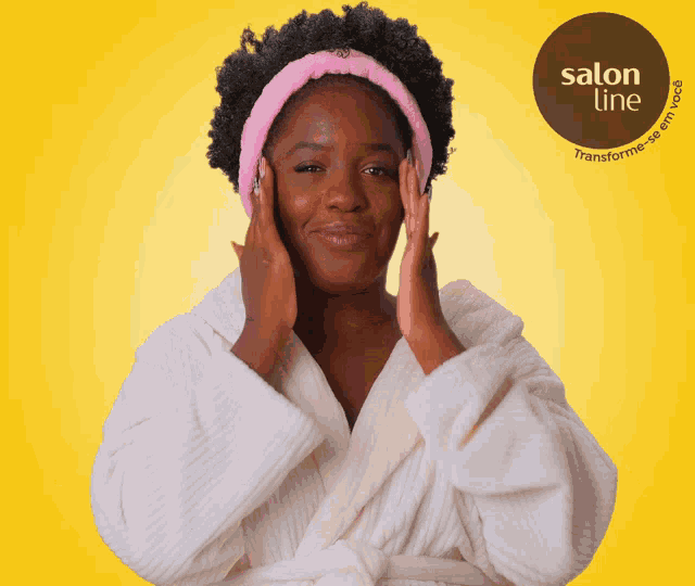 a woman in a bathrobe with a salon line logo on the bottom