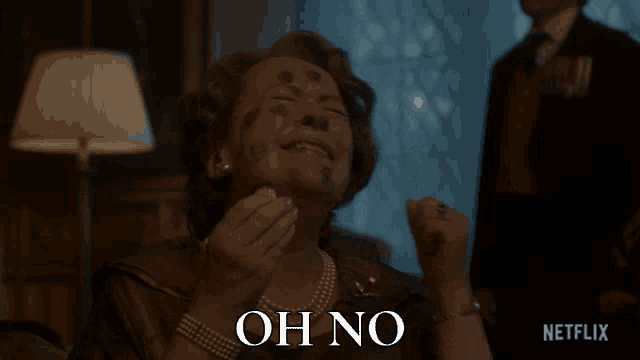 a woman in a pearl necklace says oh no in front of a netflix logo