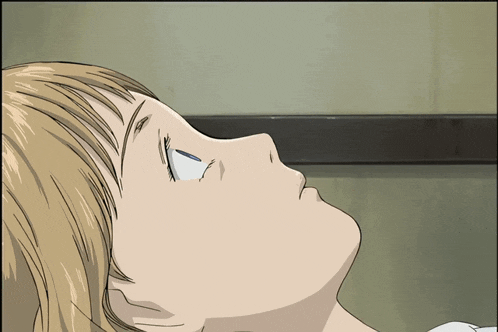 a close up of a person 's face looking up at something