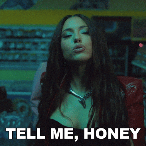 a woman is making a face with the words tell me honey below her