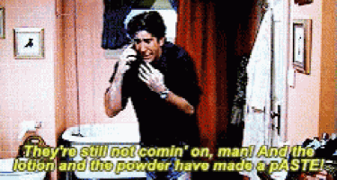a man is talking on a cell phone in a bathroom and says they 're still not comin ' on man