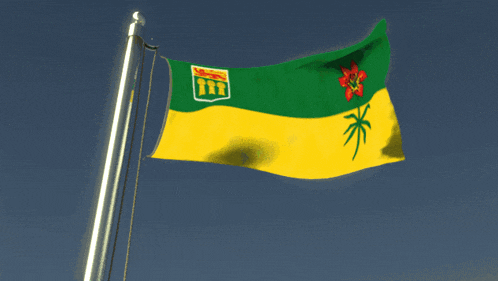 a yellow and green flag with a red flower and the word saskatoon on it