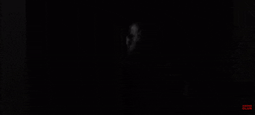 a black and white photo of a man 's face with the words " anyone glow " on the bottom