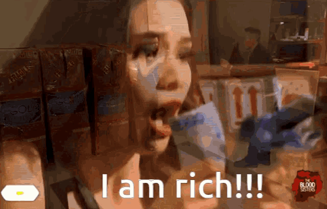 a woman says i am rich while eating something
