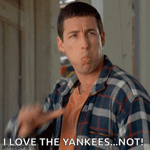 a man in a plaid shirt says " i love the yankees not "