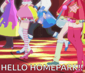 a group of girls are dancing on a stage and the words hello homepark are visible