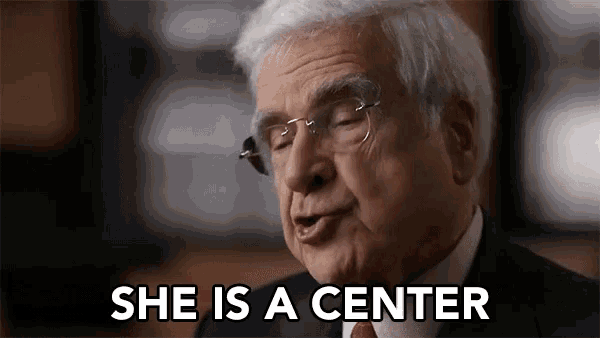 an older man in a suit and tie says she is a center