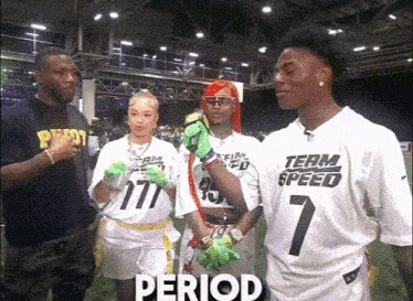 a group of people wearing team speed jerseys