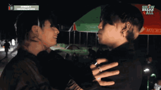 two people are hugging each other with the words may feelings above them