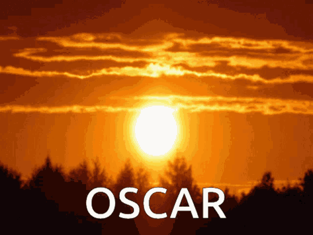 a sunset with the word oscar in white