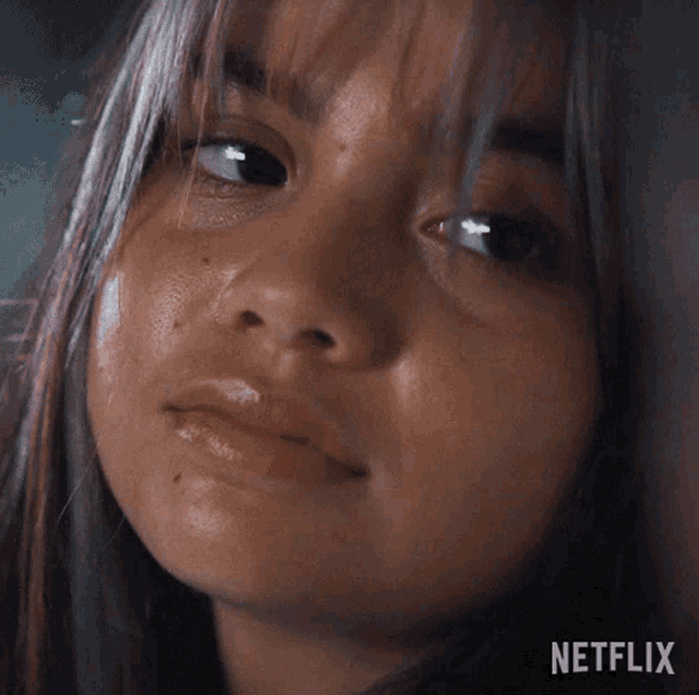 a close up of a woman 's face with the words " i know " on the bottom