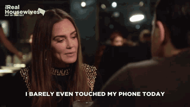 a woman talking to a man with the words " i barely even touched my phone today "
