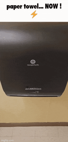 a georgia pacific paper towel dispenser is on a wall