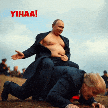 a man in a suit is kneeling down next to another man with the word yhaa on the bottom right