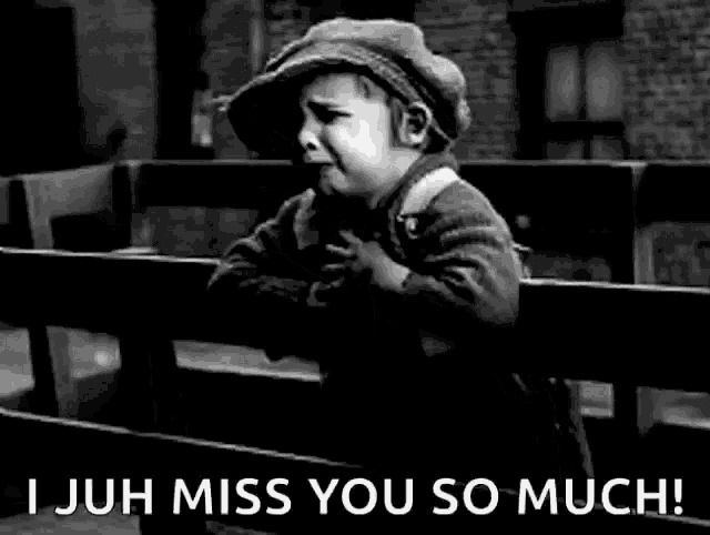 a black and white photo of a little boy sitting on a bench with the words `` i juh miss you so much '' .