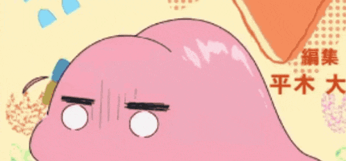 a pink cartoon character with chinese characters on the bottom