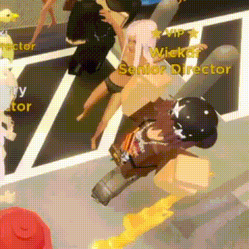 a group of people are playing a video game and one of them is called wicker senior director .