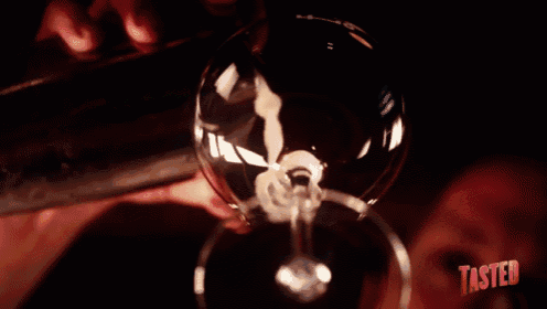 a close up of a glass that says tasted on it
