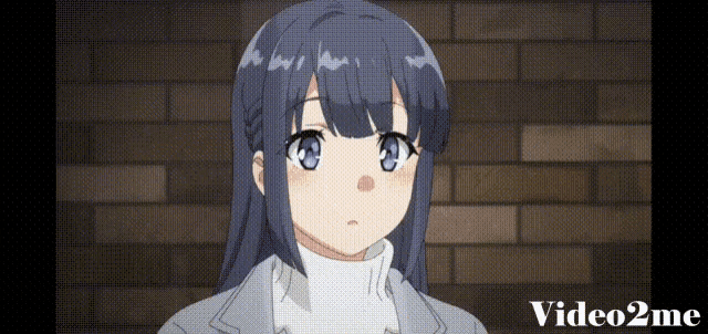 a video of a girl with blue eyes and the words video2me below