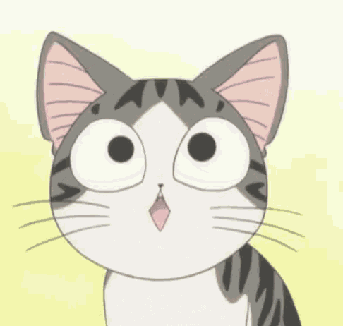 a close up of a cartoon cat with big eyes and a pink tongue .