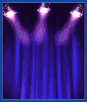 a blue curtain with hearts on it and spotlights