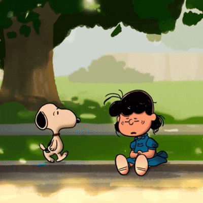 a cartoon of snoopy and lucy sitting on the sidewalk under a tree