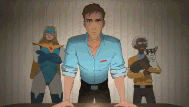 a man wearing a shirt that says msn stands in front of a group of superheros