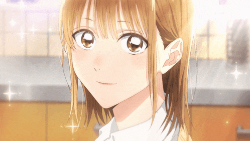 a close up of a girl with brown hair