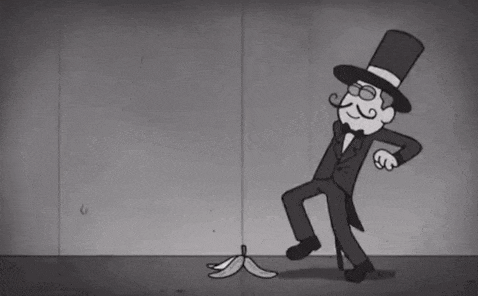 a black and white cartoon of a tire with numbers on it spinning in a circle .