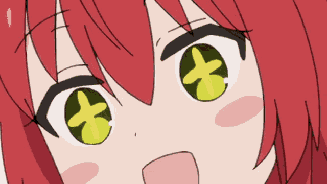 a close up of a girl with red hair and green eyes with a cross in the middle