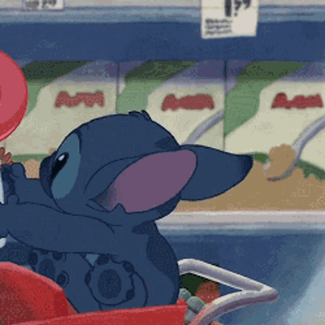 a cartoon character is sitting in a shopping cart in front of a sign that says 99