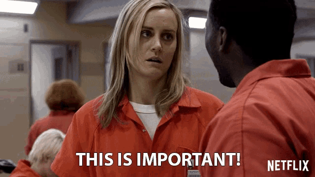 a netflix ad shows a woman and a man in orange uniforms