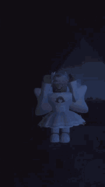 a cartoon character in a white dress is standing in the dark