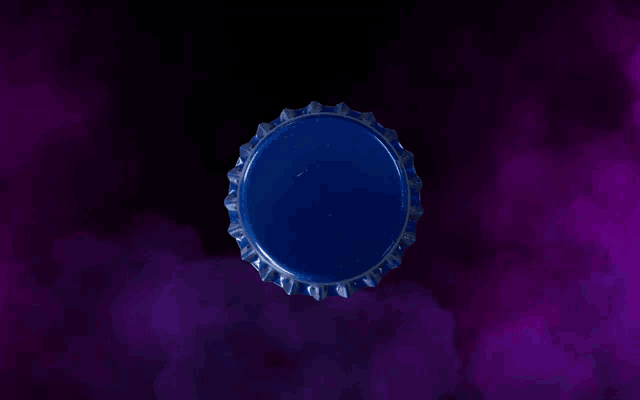 a blue bottle cap with a white line and the word stk