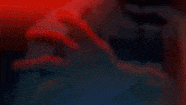 a drawing of a person 's face with a red light behind it