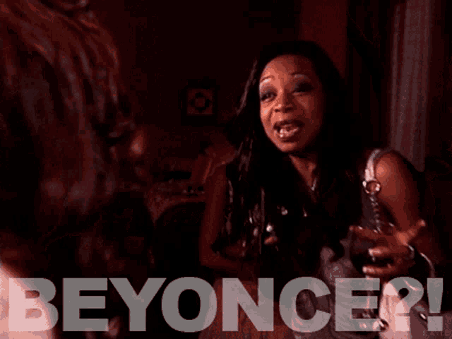 a woman is talking to another woman and the word beyonce is visible