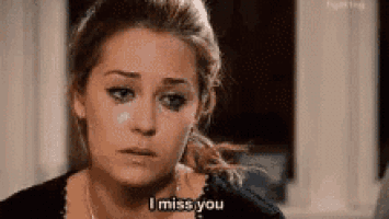 a woman is crying and saying i miss you