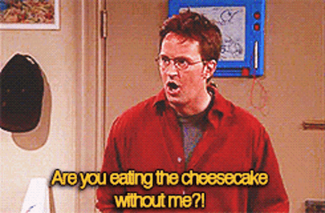 a man in a red shirt says are you eating the cheesecake without me ?