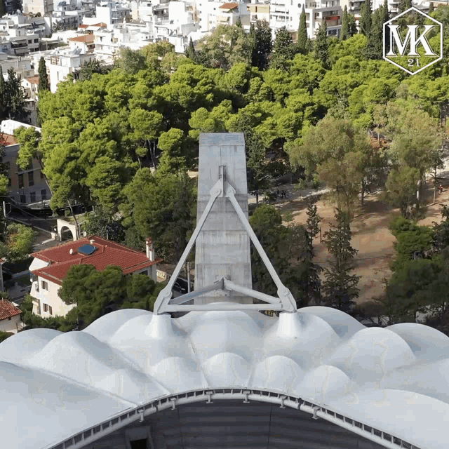 an aerial view of a building with a mk logo