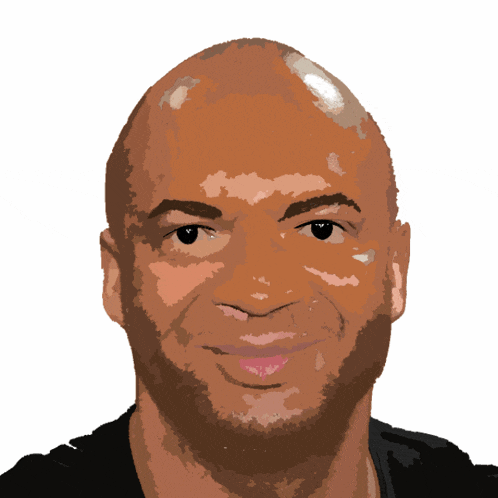 a man with a bald head and a beard is smiling for the camera