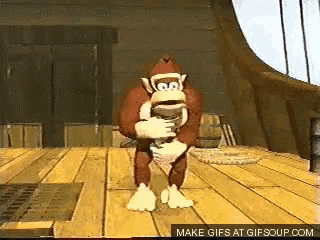 donkey kong is dancing on a wooden floor in a video game ..