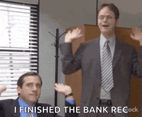 a man in a suit and tie says i finished the bank rec