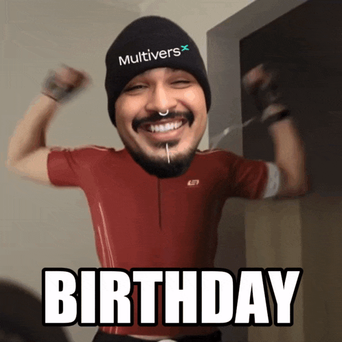 a man wearing a beanie that says multivers on it is celebrating his birthday