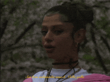 a woman in a pink jacket with the words yo think i 'm hoe yeah but ma heart is so special below her