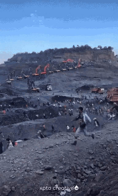 a group of people are running on a rocky hillside with the words xpto creative on the bottom