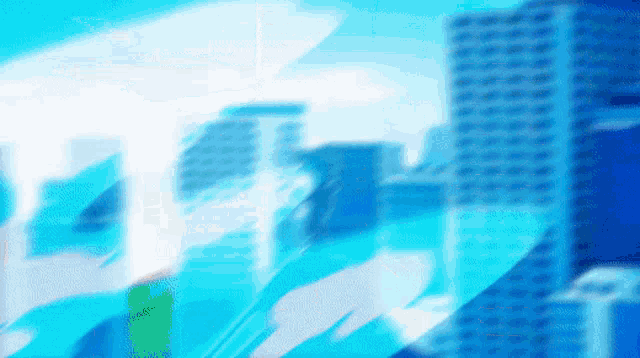 a blurry picture of a city skyline with a blue background