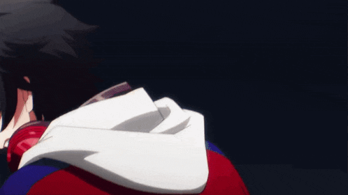 a close up of a person wearing a red , white and blue jacket with a hood .